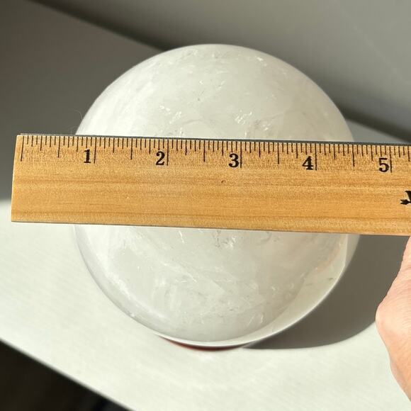 Large Milky Clear Quartz Sphere | Crystal Ball with Wispy Striped Inclusions - Picture 5 of 9